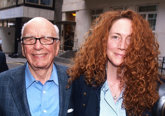 Chairman of News Corporation Rupert Murdoch, left, and Chief executive of News International Rebekah Brooks as they leave his residence in central London, Sunday, July 10, 2011. 