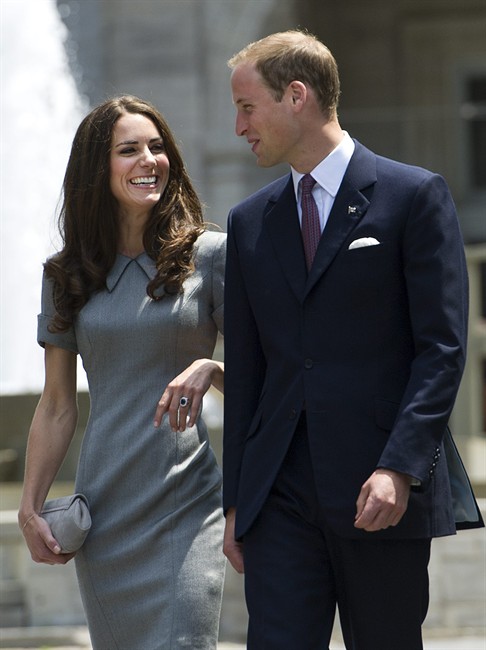The Duke and Duchess of Cambridge share a laugh before a tree planting ceremony at Rideau Hall in Ottawa on Saturday, July 2, 2011. THE CANADIAN PRESS/Nathan Denette.