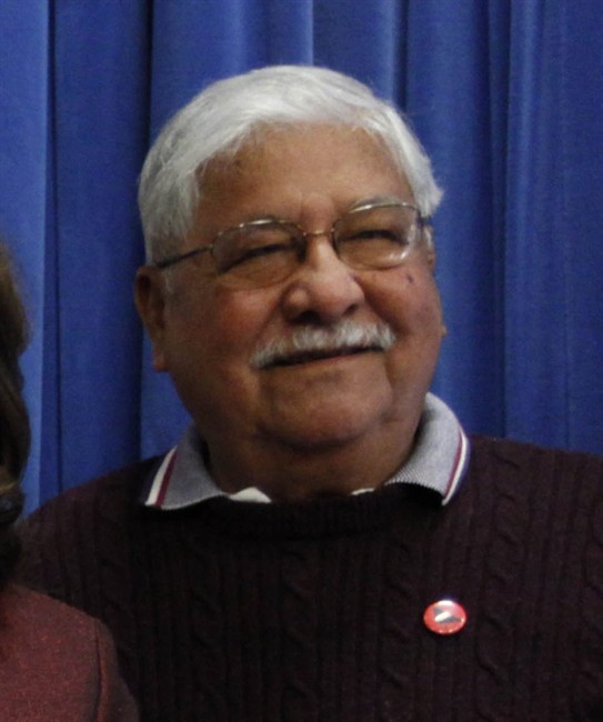 FILE - Labor Secretary Hilda Solis, center, poses with Richard Chavez, right, brother of labor leader and civil rights activist Cesar Chavez, poses during the unveiling of the mosaic mural portrait ceremony commemorating Cesar Chavez Day, in this March 31, 2010 file photo taken in Washington. Chavez, who helped his brother Cesar Chavez build the United Farmworkers of America, passed away at a Bakersfield hospital Wednesday July 27, 2011 of complications from surgery, union spokeswoman Maria Machuca said. (AP Photo/Manuel Balce Ceneta, File).