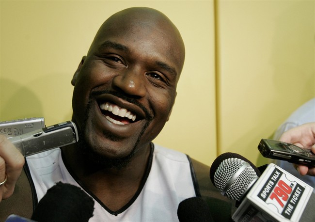 FILE - This April 19, 2007, file photo shows Miami Heat center Shaquille O'Neal talking to the news media following a team basketball practice in Miami.