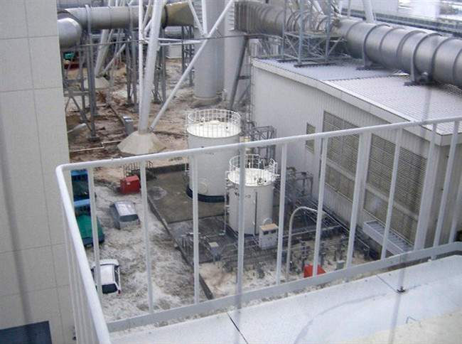 FILE - In this March 11, 2011 photo released by Tokyo Electric Power Co., tsunami waves enter a complex near the Unit 4 reactor at the Fukushima Dai-ichi nuclear complex in Okuma, Fukushima Prefecture, northeastern Japan. (AP Photo/Tokyo Electric Power Co., File).