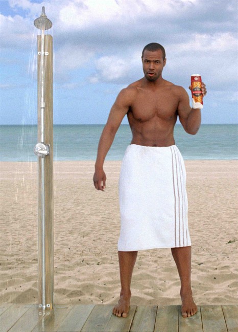 FILE - In this file video grab from an Old Spice advertisement provided by Procter & Gamble Co., shows ex-football player Isaiah Mustafa. The Old Spice Guy has won his hunk-off with Fabio. (AP Photo/Procter & Gamble Co., file).