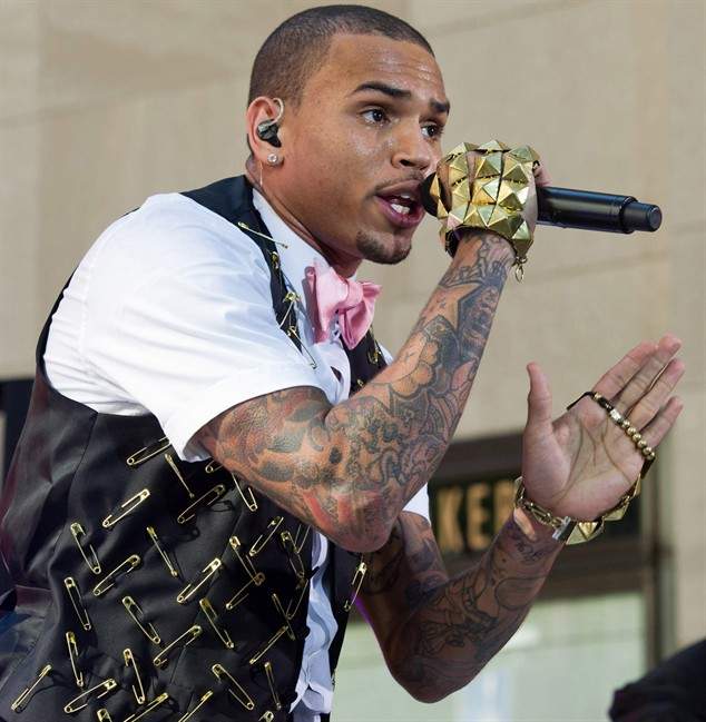 FILE - In this July 15, 2011 file photo, singer Chris Brown performs on NBC's Today Show in New York. Brown has been cast in a romantic comedy alongside Steve Harvey, Gabrielle Union, Oscar-nominee Taraji P. Henson and Michael Ealy in "Think Like A Man," an adaptation of Harvey's best-selling book advice book for women, "Act Like A Lady, Think Like A Man." (AP Photo/Charles Sykes, file).