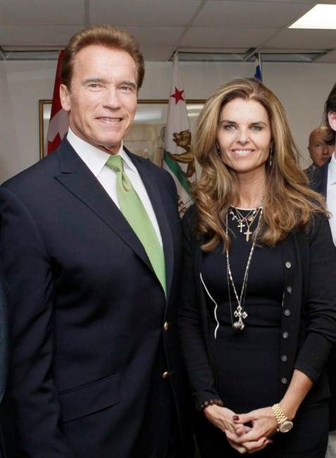 FILE - In this Oct. 2, 2009 file photo, California Gov. Arnold Schwarzenegger and his wife Maria Shriver pose for photos before they meet at the second Governors' Global Climate Summit in Los Angeles. The former California governor originally indicated in a divorce filing that he does not want to pay Shriver spousal support. Schwarzenegger filed an amended response in his divorce Monday, July 25, 2011 indicating that he is now willing to pay Shriver spousal support and for her divorce lawyer. Shriver filed divorce papers July 1, to end their marriage of 25 years. (AP Photo/Reed Saxon).
