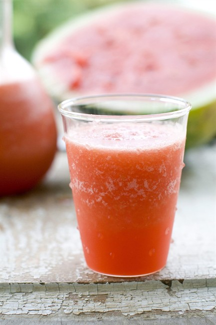 This July 11, 2011 photo shows watermelon lemonade in Concord, N.H. While you can't do much about the weather or school calendar, you can offer your little ones a few cool and refreshing afterschool treats to help them beat the back-to-school blues. (AP Photo/Matthew Mead).