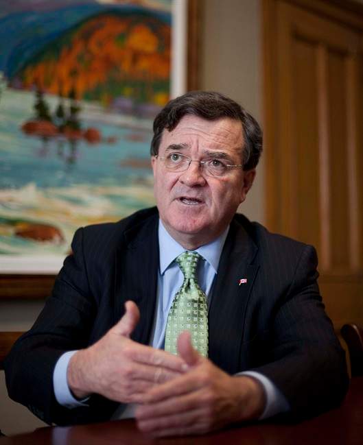 Finance Minister Jim Flaherty takes part in a year end interview in his office on Parliament Hill in Ottawa on Thursday Dec. 16, 2010. Flaherty says he's "relatively confident" U.S. legislators will reach an agreement allowing them to raise the debt ceiling for that country. THE CANADIAN PRESS/Sean Kilpatrick.