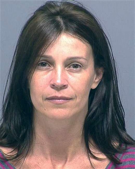 FILE - This July 14, 2011 file photo provided by the Clackamas County Sheriff's Office shows Joanne Baldwin. The wife of actor Daniel Baldwin is scheduled appear in Lake Oswego, Ore., municipal court Wednesday, July 20, on a probation violation hearing. Joanne Baldwin has been charged with violating her probation on a previous drunken driving charge. The couple has two children. Daniel Baldwin has filed for divorce and filed a restraining order on his wife, claiming she punched him and threatened him with a knife in front of the couple's children. (AP Photo/Clackamas County Sheriff's Office, File).