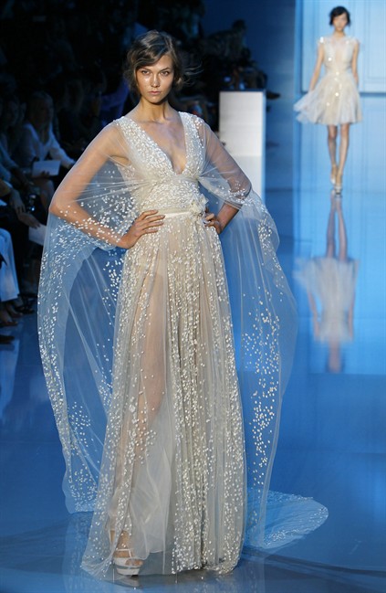 A model wears a creation for the Elie Saab Fall-Winter 2011-2012 Haute Couture fashion collection presented in Paris, Wednesday, July 6, 2011. (AP Photo/Francois Mori).