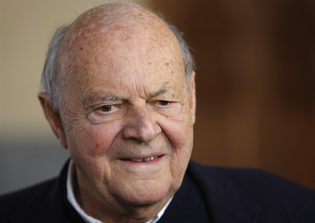 In this photo taken Tuesday, March 23, 2010, American painter Cy Twombly is seen at the Louvre museum in Paris. Celebrated American painter Cy Twombly, whose large-scale paintings featuring scribbles, graffiti and unusual materials fetched millions at auction, has died at age 83. Gagosian Gallery spokeswoman Virginia Coleman said Twombly, who had suffered from cancer for some years, died Tuesday, July 5, 2011. Eric Mezil, director of the Lambert Collection in Avignon, France where a Twombly show opened in June, said he died in Rome. (AP Photo/Christophe Ena).
