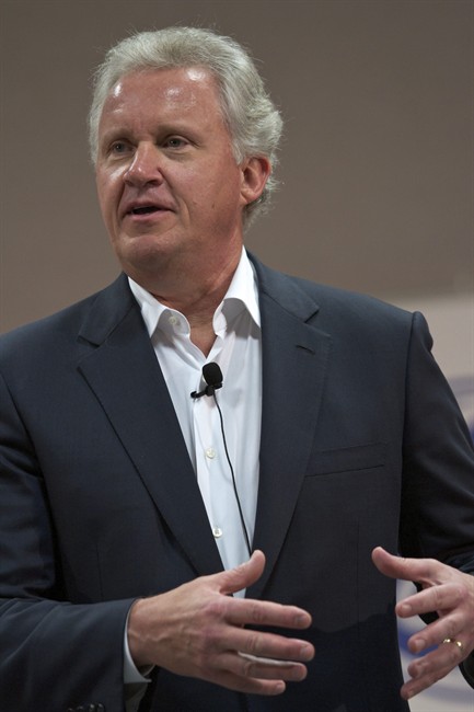 In this June 13, 2011 photo, General Electric CEO Jeff Immelt, speaks to employees, during a town hall meeting at the GE Energy Greenville Operations campus in Greenville, S.C. General Electric Co. says earnings grew 21 percent in the second quarter as its lending arm continued to recover from the recession. General Electric Co. said Friday, July 22, 2011, earnings grew 21 percent in the second quarter as its lending arm continued to recover from the recession.(AP Photo/Brett Flashnick).