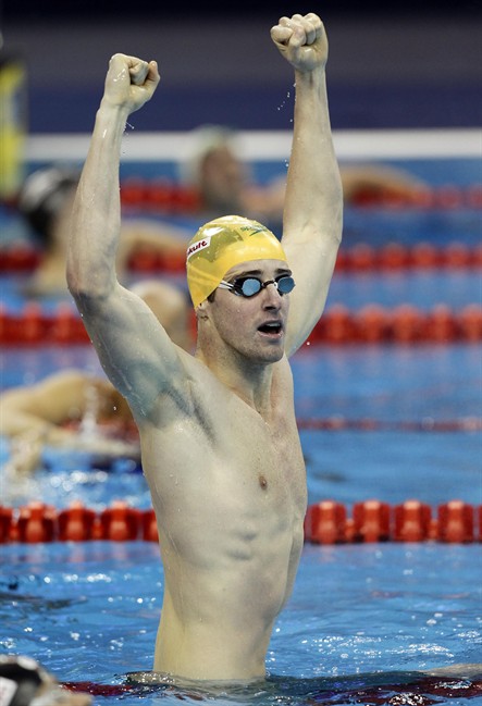 Australia's James Magnussen looks at the scoreboard after winning the men's 100m Freestyle final at the FINA Swimming World Championships in Shanghai, China, Thursday, July 28, 2011. (AP Photo/Wong Maye-E).