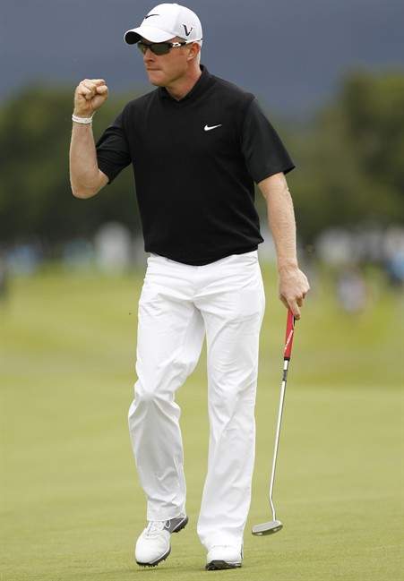 England's Simon Dyson reacts after getting a birdie on hole eleven during the final round of the Irish Open Golf Championship, Killarney Golf and Fishing Club, Killarney Ireland, Sunday, July, 31, 2011. Dyson won the tournament finishing fifteen under par. (AP Photo/Peter Morrison).