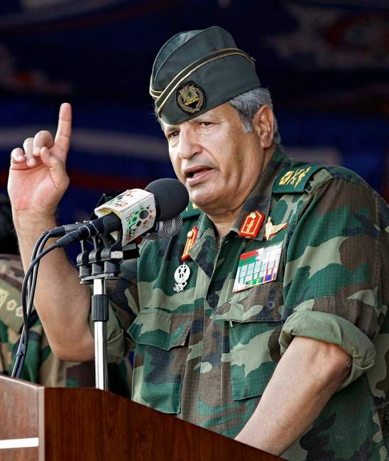 In this photo taken Wednesday, July 6, 2011, rebel forces chief commander Abdel Fattah Younes speaks during a rally in the rebel-held city of Benghazi, Libya. Rebel military spokesman Mohammed al-Rijali said the commander, Abdel Fattah Younes, was taken from his operations room near the front to the main rebel stronghold, the eastern city of Benghazi, for interrogation. In a separate development, the rebels said they had detained their own top military commander for questioning on suspicion his family might still have ties to regime. (AP Photo/Sergey Ponomarev).