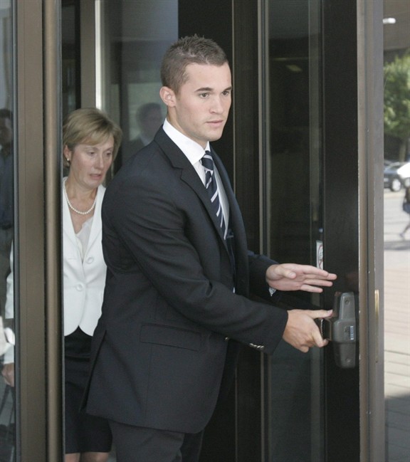 Jack Tobin, son of former Newfoundland premier Brian Tobin, and his mother, Jodean, leave court in Ottawa on Aug. 5, 2011. THE CANADIAN PRESS/ Patrick Doyle.