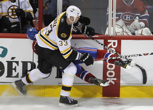 Montreal Canadiens' Max Pacioretty is hit by Boston Bruins' Zdeno Chara during second period NHL hockey action Tuesday, March 8, 2011 in Montreal. A police investigation into Boston Bruins captain Zdeno Chara has been completed and the file has been transferred, as per standard procedure, to criminal prosecutors. Now that the investigation is over Crown lawyers must decide whether to lay charges over Chara's devastating hit against Montreal Canadiens forward Max Pacioretty. THE CANADIAN PRESS/Paul Chiasson.