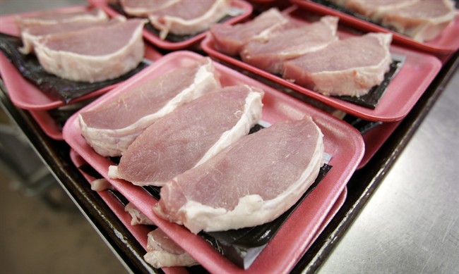 Boneless pork loins sit waiting to be packaged at a local Dahl's grocery store, Thursday, March 3, 2011, in Des Moines, Iowa. The union representing federal meat inspectors says a new system for inspections at meat plants in B.C., Saskatchewan and Manitoba could leave consumers at risk.Agriculture Union president Bob Kingston says the federal government plans to abandon its responsibility to inspect meat plants in those provinces and leave the provincial governments in charge of their own inspections. THE CANADIAN PRESS/AP-Charlie Neibergall.