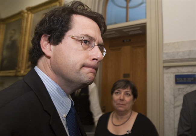 Parti Quebecois MLA Bernard Drainville walks out of a caucus meeting Tuesday, June 7, 2011 at the legislature in Quebec City. A prominent member of the Parti Quebecois says it is staring into the political abyss. Drainville believes the party urgently needs to review its strategy on sovereignty in the wake of internal bickering and the loss of five members of the legislature this summer. THE CANADIAN PRESS/Jacques Boissinot.