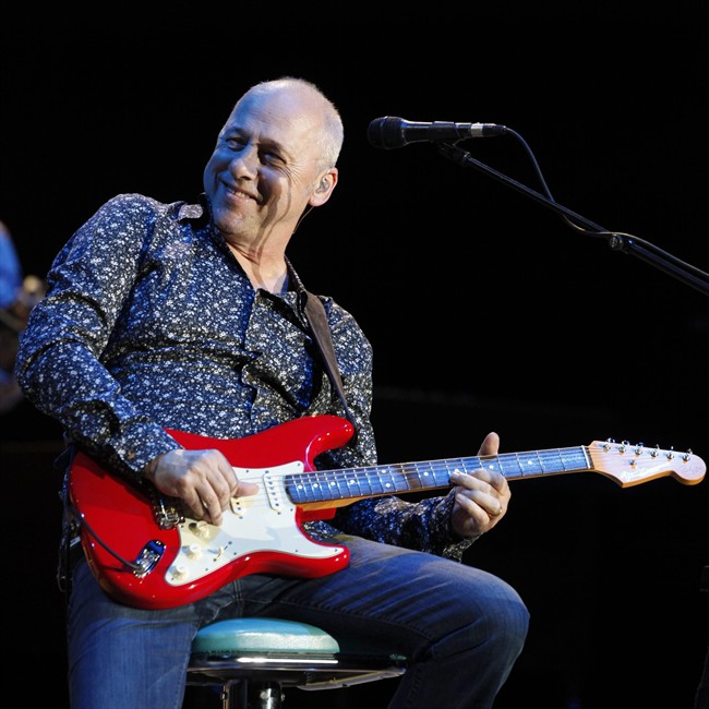 The Canadian Broadcast Standards Council has tempered a ruling that deemed the Dire Straits hit "Money for Nothing" unfit for radio, saying that while the homophobic slur in the song is inappropriate, it must be taken in context and that individual radio stations can decide what their listeners want to hear. British musician Mark Knopfler is shown performing on stage at the Festhalle in Frankfurt, Germany, on Monday, June 7, 2010.