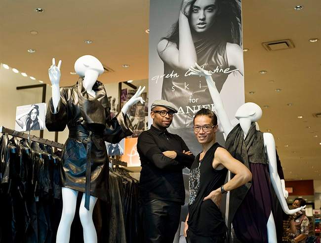 Fashion designers Kirk Pickersgill, left, and Stephen Wong, right, the designers behind Greta Constantine pose for a photo at Danier Leather at the Yorkdale Shopping Centre in Toronto on Wednesday August 17, 2011. Pickersgill and Wong are designing new line for Danier. THE CANADIAN PRESS/Aaron Vincent Elkaim.