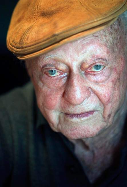 In this Nov. 29, 2009 photo, Stetson Kennedy sits in the dining room of his Valencia Street home in downtown St. Augustine, Fla. Author and folklorist Stetson Kennedy, who infiltrated the Ku Klux Klan six decades ago and exposed its secrets to authorities and the public but was also criticized for possibly exaggerating his exploits, died Saturday, Aug. 27, 2011. He was 94. (AP Photo/St. Augustine Record, Daron Dean).
