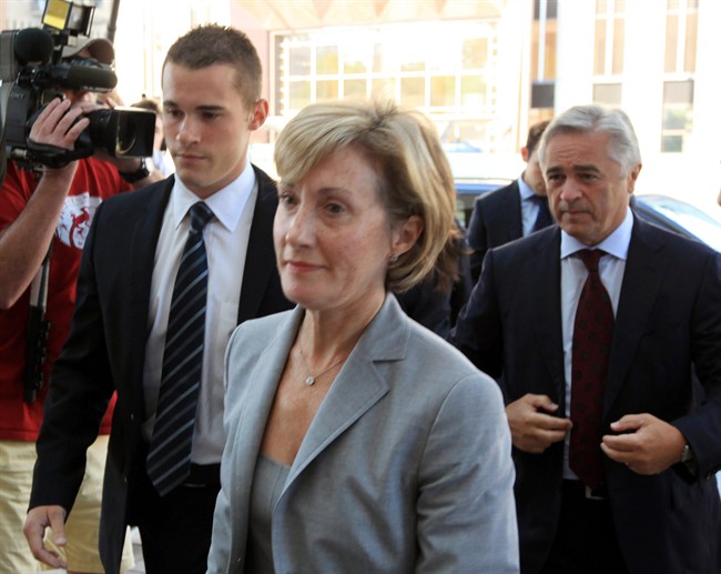 Jack Tobin, left, arrives at an Ottawa court with his mother, Jodean, and father, former Newfoundland premier Brian Tobin, in Ottawa on Thursday, August 4, 2011. THE CANADIAN PRESS/Fred Chartrand.