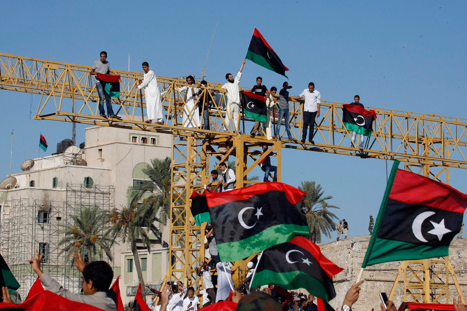In double celebrations, Libyans mark Muslim holiday and Gadhafi’s ...