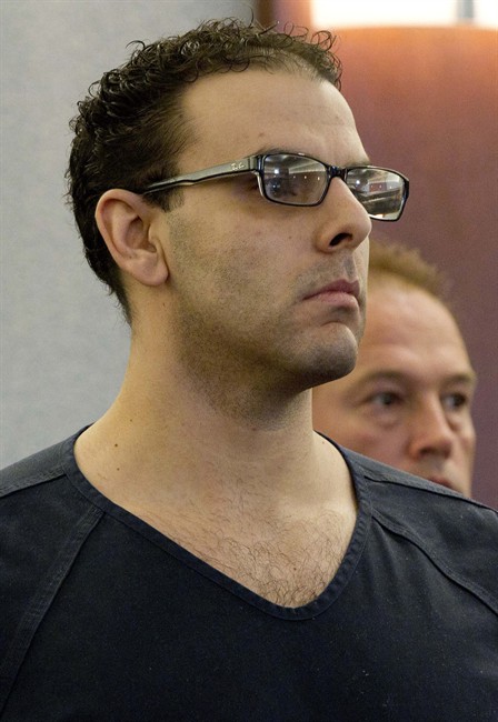 FILE - In this April 8, 2011 file photo, Anthony Carleo, 30, listens in district court in Las Vegas. Carleo, who admitted to holding up the posh Bellagio resort on the Las Vegas Strip of $1.5 million in casino chips, is scheduled to be sentenced Tuesday, Aug. 23, 2011, and is expected to get at least three years in prison. (AP Photo/Julie Jacobson, File).