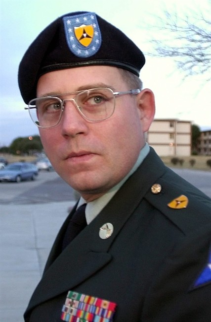 FILE - In this Jan. 15, 2005 file photo, Army Spc. Charles Graner walks into the judicial complex at Fort Hood, Texas, for the sentencing phase of his court-martial. Graner, the alleged ringleader of detainee abuses at Abu Ghraib in Iraq, was released Saturday, Aug. 6, 2011 from a military prison after serving more than 6½ years of a 10-year sentence, an Army spokeswoman said. (AP Photo/LM Otero, File).