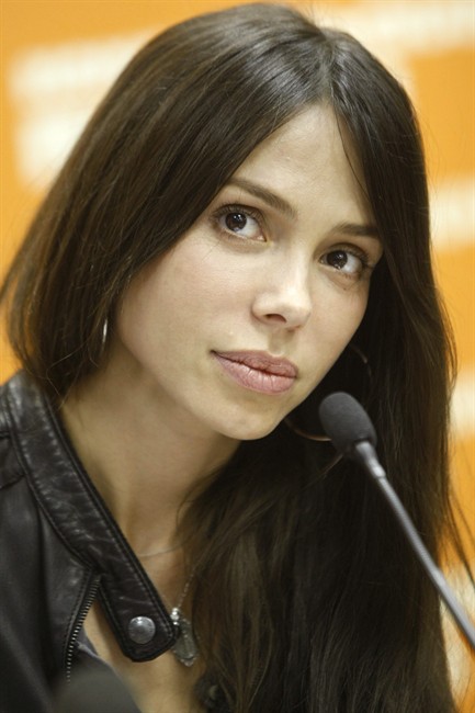 FILE - In this April 19, 2010, file photo, Mel Gibson's ex-girlfriend, Russian-born singer, songwriter Oksana Grigorieva, talks during a news conference in Moscow. Los Angeles Superior Court officials said in a statement late Friday, Aug. 26, 2011, that Gibson and Grigorieva, have reached a settlement of their bitterly fought separation. (AP Photo/Mikhail Metzel, File).