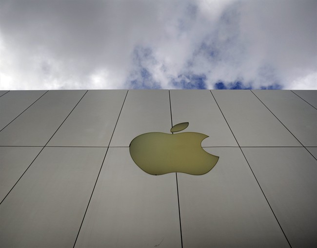 Apple's logo is seen on an Apple store in San Francisco.