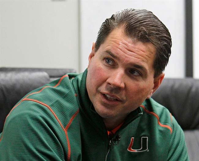 FILE - This Feb. 2, 2011, file photo shows Miami head coach Al Golden during an interview in Coral Gables, Fla. Golden says some of his player may have made mistakes that prompted an NCAA investigation into convicted Ponzi schemer Nevin Shapiro's role with the program. (AP Photo/Alan Diaz, File).