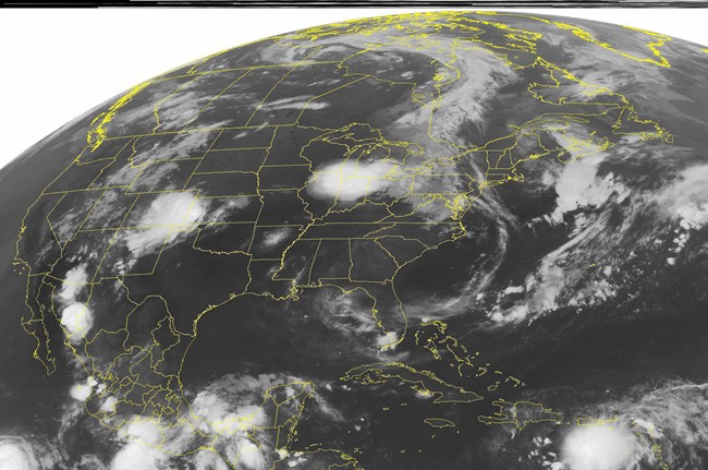 This NOAA satellite image taken Wednesday, Aug. 3, 2011 at 1:45 a.m. EDT shows cloud cover in the Great Lakes region as well as the High Plains where both regions continue to see rain fall into the night. In the Caribbean, tropical storm Emily pushes northeastward towards Hispaniola. (AP PHOTO/WEATHER UNDERGROUND).