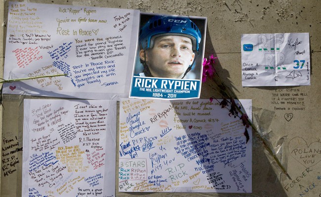 Messages left by fans are pictured at a makeshift memorial to honour former Vancouver Canucks hockey player Rick Rypien outside Rogers Arena in Vancouver, B.C., on Wednesday August 17, 2011. Rypien, who signed a one-year deal with the Winnipeg Jets in July, was found dead at his Alberta home on Monday. THE CANADIAN PRESS/Darryl Dyck.
