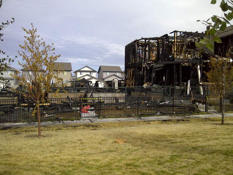 Arson confirmed in massive Leduc fire that left six families homeless - image