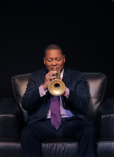 American trumpeter and composer, Wynton Marsalis, on stage at the Market Theatre in Johannesburg, Tuesday, Aug. 23, 2011. Marsalis shared memories of his childhood and played a few tunes as a prelude to headlining Johannesburg's annual jazz festival. (AP Photo/Denis Farrell).