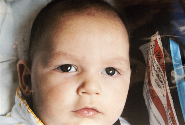 A photo of baby Joseph Maraachli is shown at the Lamplighter Inn in London, Ontario on February 21, 2011. A Windsor, Ont., infant at the centre of controversy over receiving a tracheotomy has died.His father, Moe Maraachli, said Tuesday night that his son, Joseph, who had a progressive and fatal neurological disease, had died. THE CANADIAN PRESS/Craig Glover.