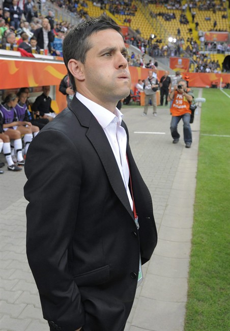 John Herdman, former coach of New Zealand's women's team, is the new head coach of the Canadian women's soccer team. New Zealand team coach John Herdman waits for the beginning of the group B match between New Zealand and England at the Women’s Soccer World Cup in Dresden, Germany, Friday, June 1, 2011. THE CANADIAN PRESS/AP-Jens Meyer.