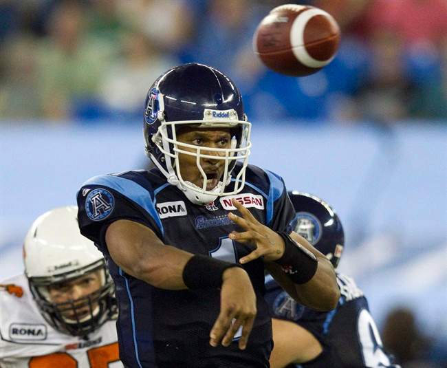 Toronto Argonauts quarterback Cleo Lemon launches a pass against the B.C. Lions during first half CFL action in Toronto on Friday September 2, 2011. The Cleo Lemon era with the Toronto Argonauts is over.The Argos have released the veteran quarterback less than two seasons after signing him to be their starter. THE CANADIAN PRESS/Frank Gunn.