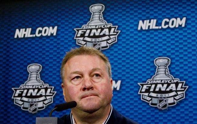 Vancouver Canucks' General Manager Mike Gillis speaks to reporters in Vancouver, B.C., on June 14, 2011. Gillis believes the Canucks are good enough to make another run at the Stanley Cup next year and that's why he didn't make any major player moves over the summer. THE CANADIAN PRESS/Darryl Dyck.