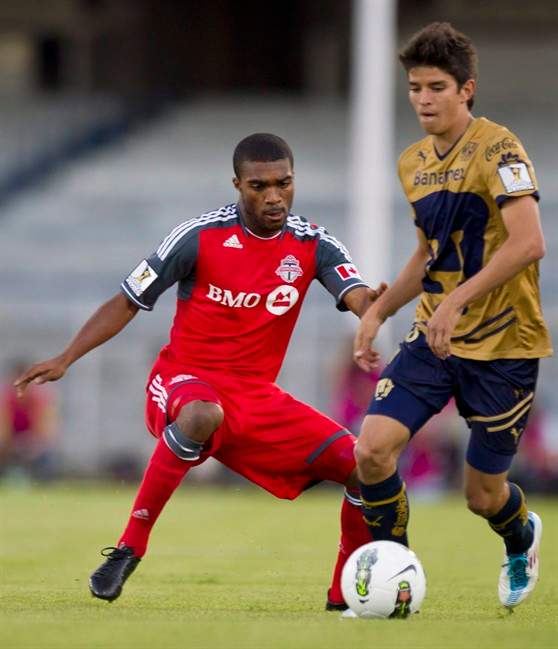 Canadian Toronto FC's Ashtone Morgan chases Mexico's Pumas' David Cabrera during CONCACAF Champions League actino in Mexico City, on Sept. 14, 2011. Canadian soccer coach Stephen Hart has called up two newcomers for upcoming World Cup qualifying games against St. Lucia and Puerto Rico.The two new faces are midfielder Joseph Di Chiara and fullback Ashtone Morgan. THE CANADIAN PRESS/AP, Christian Palma.