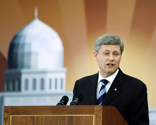 Prime Minister Stephen Harper, speaks at the opening of the Baitun Nur Mosque in Calgary, on July 5, 2008. The NDP is accusing Prime Minister Stephen Harper of dividing Canadians by singling out "Islamicism" as the country's biggest security threat. THE CANADIAN PRESS/Jeff McIntosh.