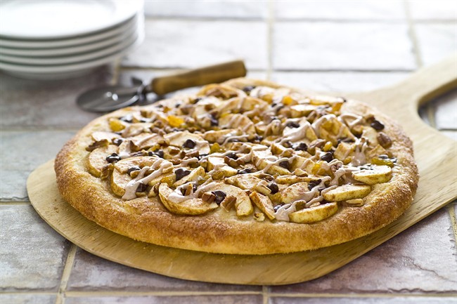 Apple, chocolate chip, raisin and nut dessert pizza is shown in this undated handout photo. THE CANADIAN PRESS.