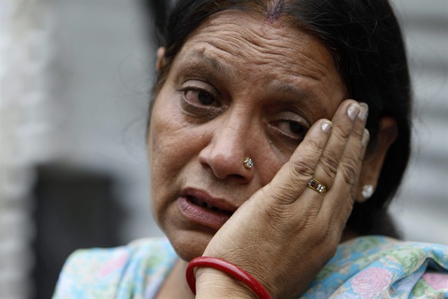 A relative of one of a bomb blast victims reacts at the RML hospital in New Delhi, India, Wednesday, Sept. 7, 2011. A bomb apparently hidden in a suitcase exploded Wednesday morning outside a crowded gate leading to the High Court in New Delhi, killing nine people and wounding 45 others, officials said. (AP Photo/Gurinder Osan).