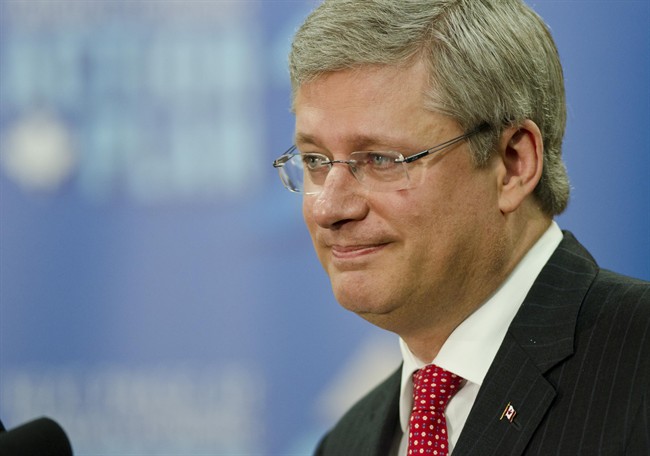 Prime Minister Stephen Harper takes questions from reporters after visiting the Vaccine and Infectious Disease Organization (VIDO) at the University of Saskatchewan on Friday September 16, 2011 in Saskatoon, Saskatchewan. THE CANADIAN PRESS/Derek Mortensen.