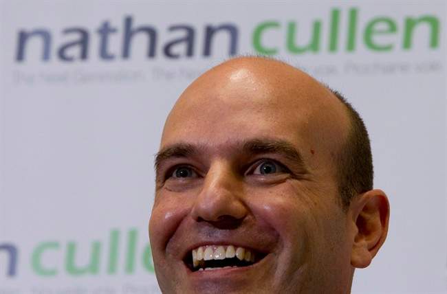 NDP MP Nathan Cullen smiles as he addresses the media in downtown Vancouver, Friday, Sept. 30, 2011. Cullen announced that he will seek the leadership of the federal NDP party. THE CANADIAN PRESS/Jonathan Hayward.