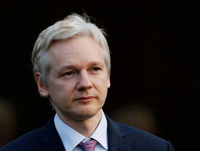 FILE - This Monday, Feb. 7, 2011 file photo shows WikiLeaks founder Julian Assange leaving Belmarsh Magistrates' Court in London. A long-awaited memoir by WikiLeaks founder Julian Assange is finally being published _ without his approval. British publisher Canongate said Wednesday Sept. 21, 2011 that the book, billed as an "unauthorized autobiography," will be for sale in stores and online Thursday. (AP Photo/Kirsty Wigglesworth, File).