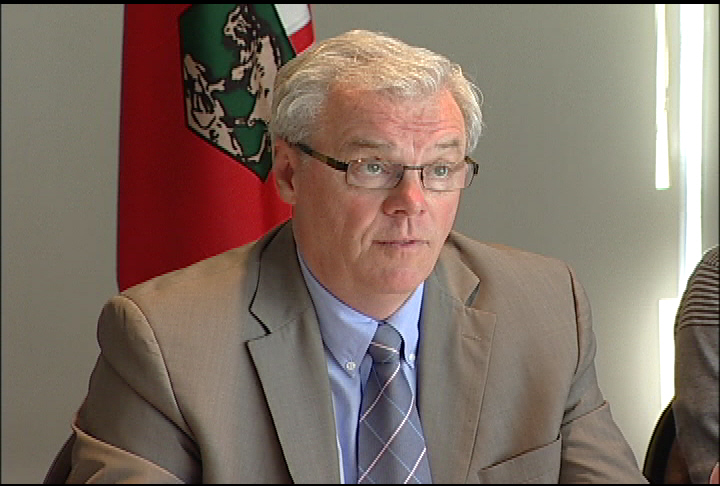 Manitoba's justice minister added his voice Tuesday to calls for Premier Greg Selinger to step down, citing plummeting public support for the NDP government.
