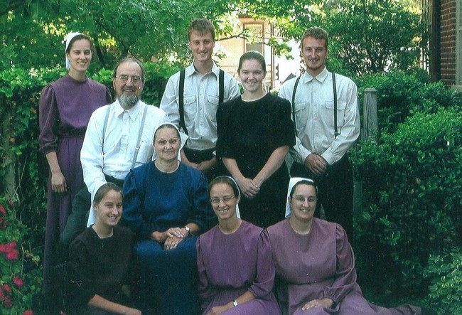 FILE - This undated family photo provided by Jessie Crabtree shows, back row from left: Anna Esh, John Esh, Amos Esh and his wife Mary and Abner Esh. At front row from left are Rachel Esh, Sadie Esh, Betty Esh and Rose Esh. Anna, John, Rachel, Sadie and Rose. All died in the fatal vehicle accident on Interstate 65 early Friday morning March 26, 2010, near Munfordville, Ky., involving a tractor-trailer and a van. National Transportation Safety Board investigators on Tuesday, Sept. 13, 2011 said that 45-year-old truck driver Kenneth Laymon of Jasper, Ala., had just made an outgoing call that lasted one second before his truck struck a van carrying the group, who were on their way to a wedding in Iowa. (AP Photo/Courtesy of Jessie Crabtree).