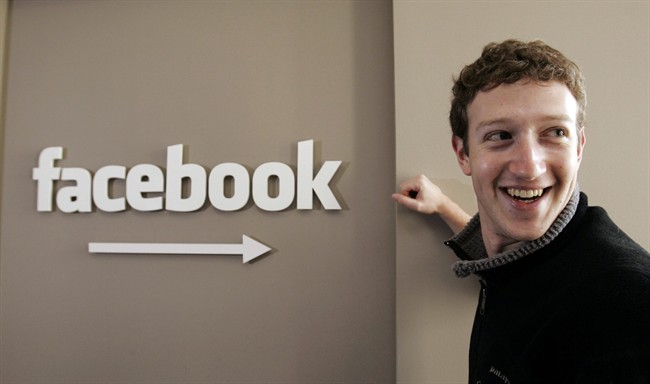 FILE - Facebook.com founder Mark Zuckerberg smiles at Facebook headquarters in Palo Alto, Calif., in this Feb. 5, 2007, file photo. Facebook, the social network, is tweaking the home pages of its 750 million users, much to the chagrin of some very vocal folks. The world's largest online social network is expected to announce even more changes on Thursday, when it holds its annual f8 conference in San Francisco for developers who create games and other applications for its site.