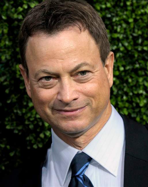 FILE - In this July 28, 2010 file photo, actor Gary Sinise arrives at the CBS CW Showtime press tour party in Beverly Hills, Calif. Ever since playing Lt. Dan — the character in the movie "Forrest Gump" who lost his legs fighting in Vietnam — Sinise has devoted time and treasure to helping the nation's military personnel and first responders. (AP Photo/Dan Steinberg, File).